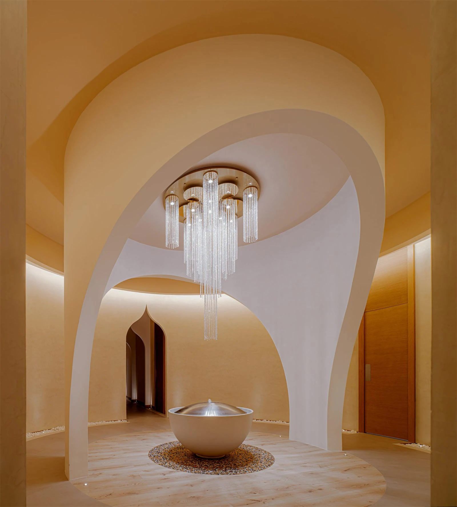 Warm arched spa interior with chandelier, interior photography in Dubai