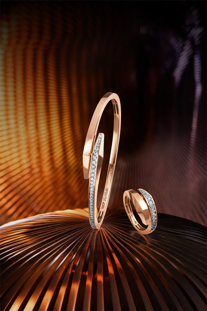 Rose gold diamond bangle and ring on a bronze fluted set