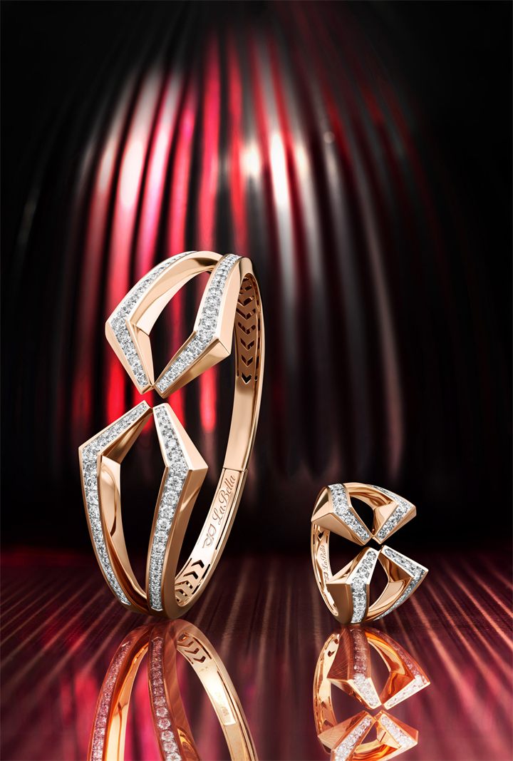 Rose gold geometric diamond jewellery on red fluted glass