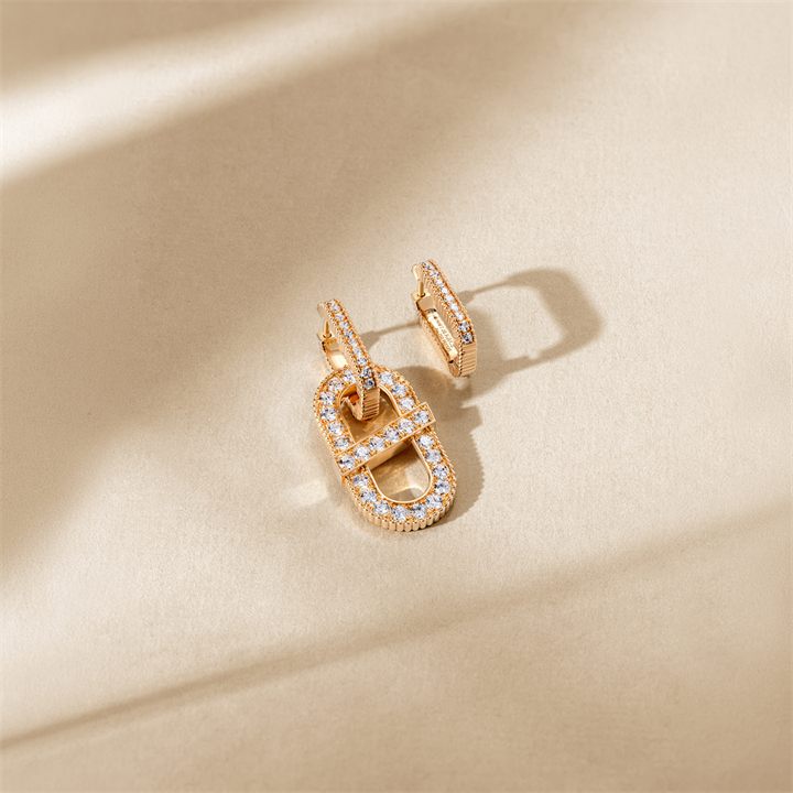 Rose gold ring with enamel detail on a warm beige set