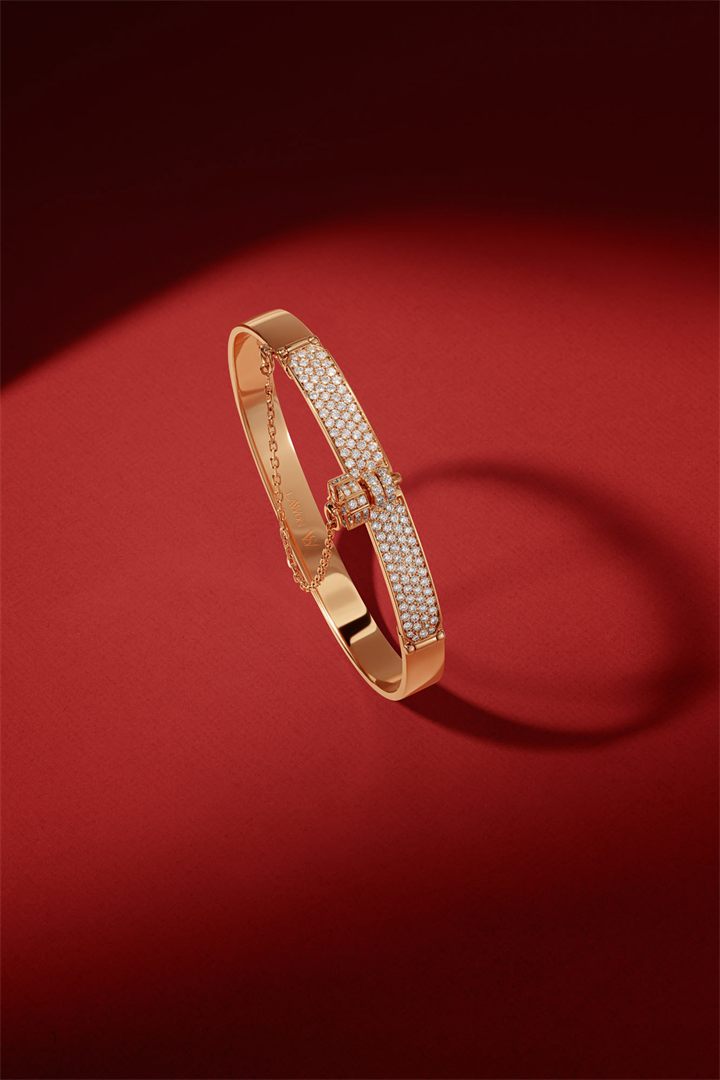 Rose gold diamond bangle on a red set