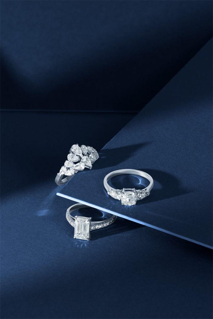 Diamond and coloured gemstone high jewellery on a navy sculpted set
